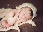 Photo nouveau-ne Photo studio de bébé endormi