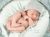 Photo nouveau-ne Photo teintes bleues de bébé dans une corbeille