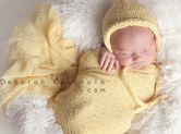 Photo nouveau-ne Photo de nouveau-né dans son cocon textile