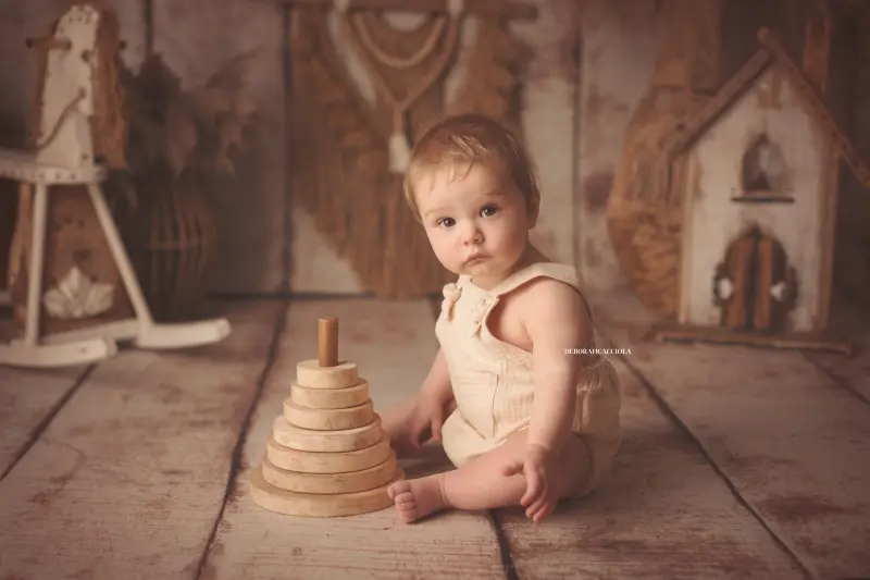 baby portrait in Orléans, France: tender baby portrait, wide natural composition, natural tones