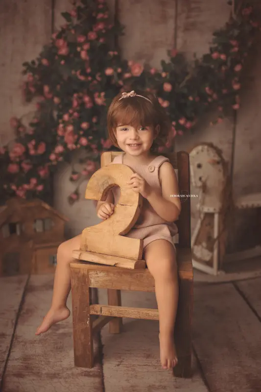 birthday photo in Orléans, France, festive studio moment, polished vertical portrait, light palette