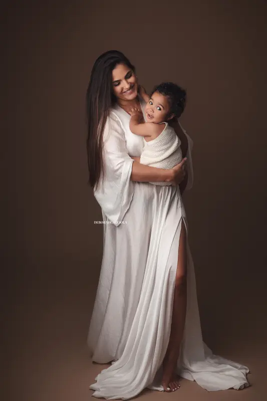 mother and me portrait in Orléans, France: mother and child, polished vertical portrait, light palette