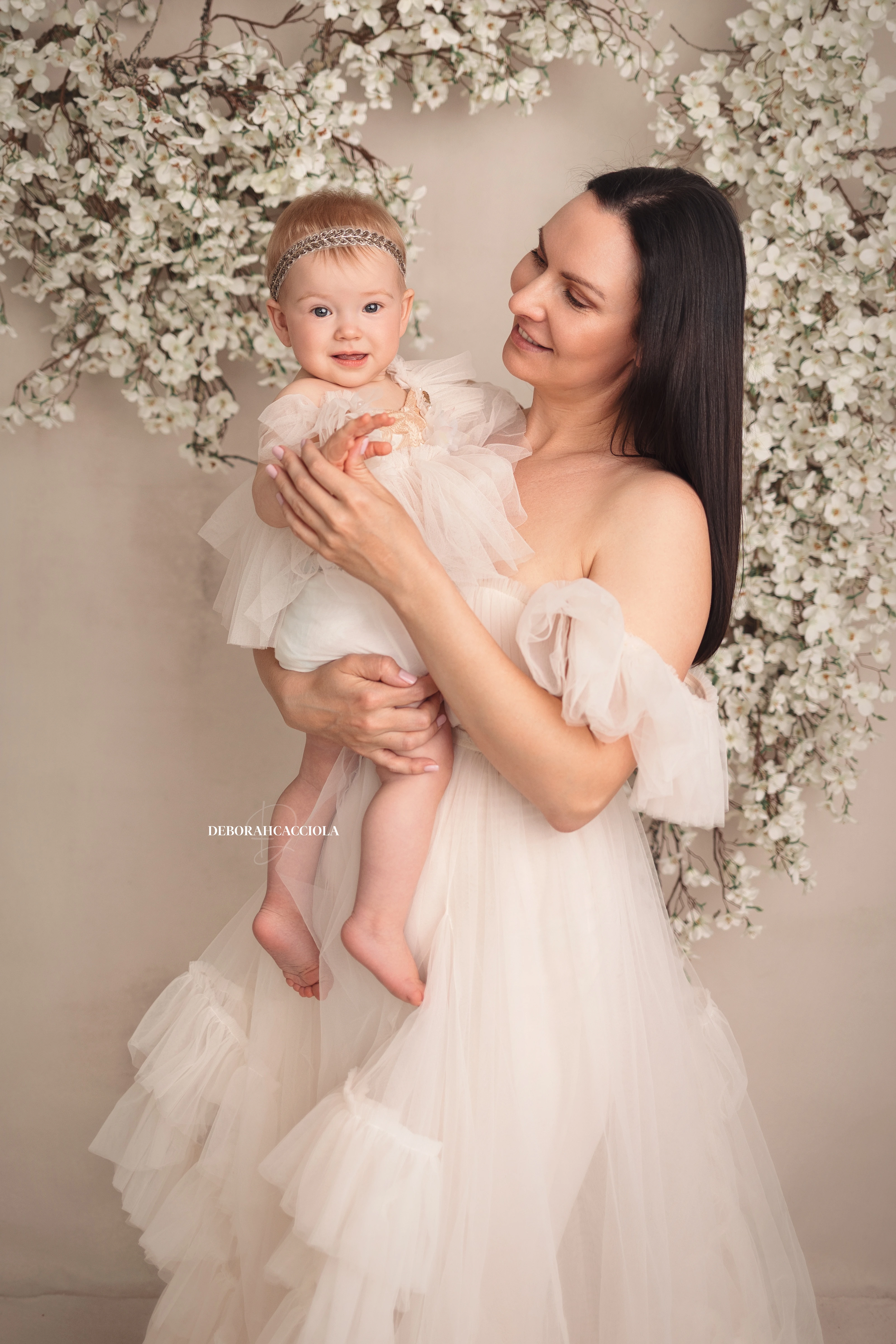 mother and me photo studio Orléans, France: tender moment between mother and child, soft vertical framing, natural result