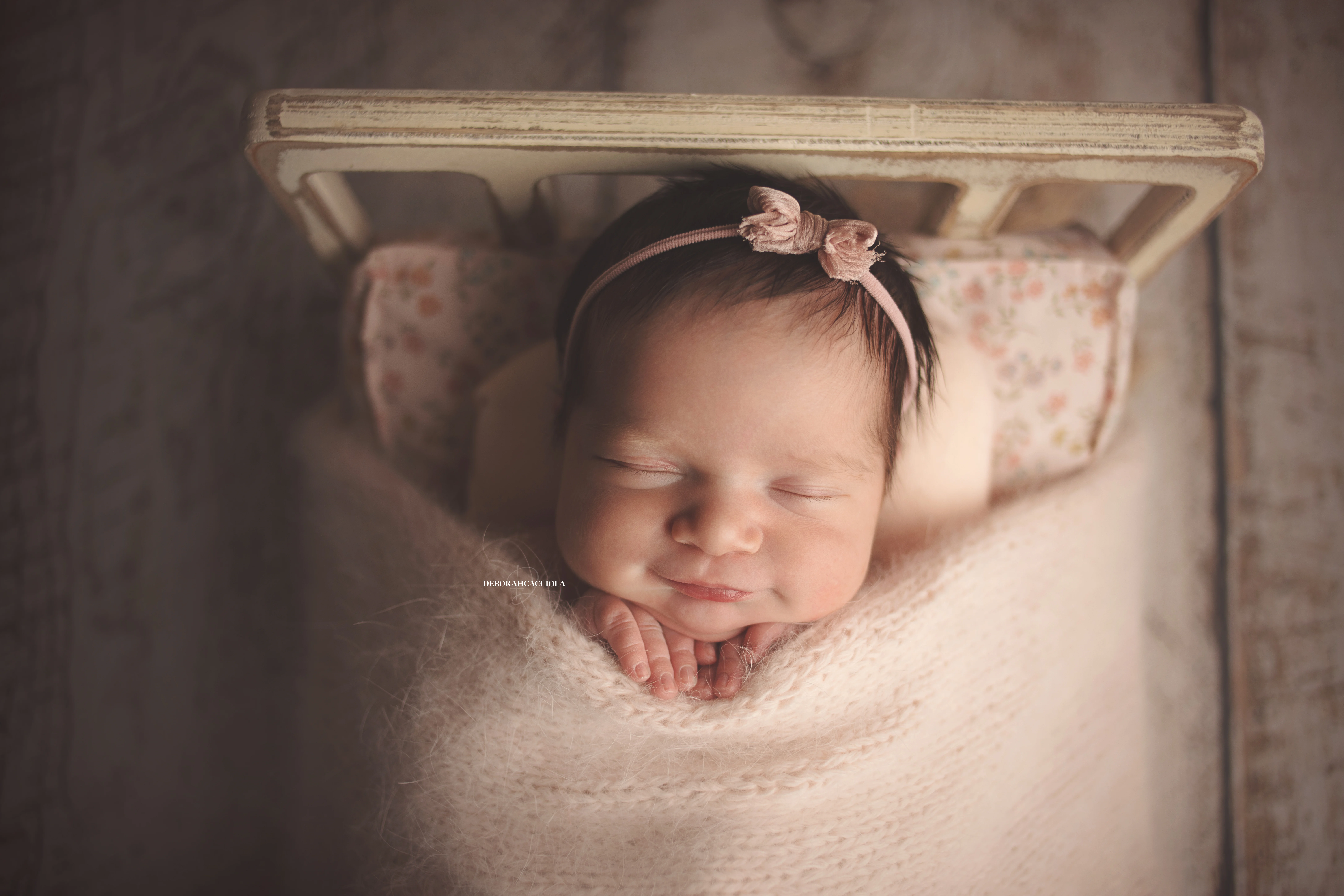 baby session in Orléans, France - tender moment with baby, harmonious wide shot, soft colors