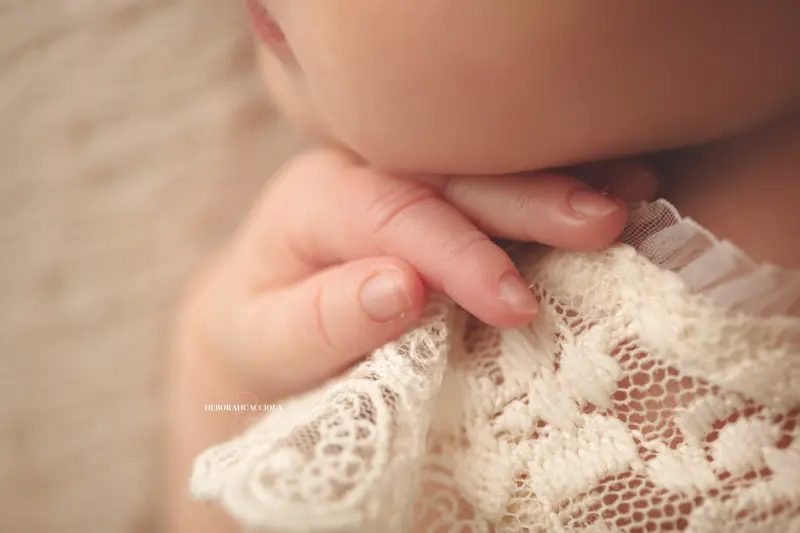 baby session in Orléans, France - tender moment with baby, harmonious wide shot, natural tones