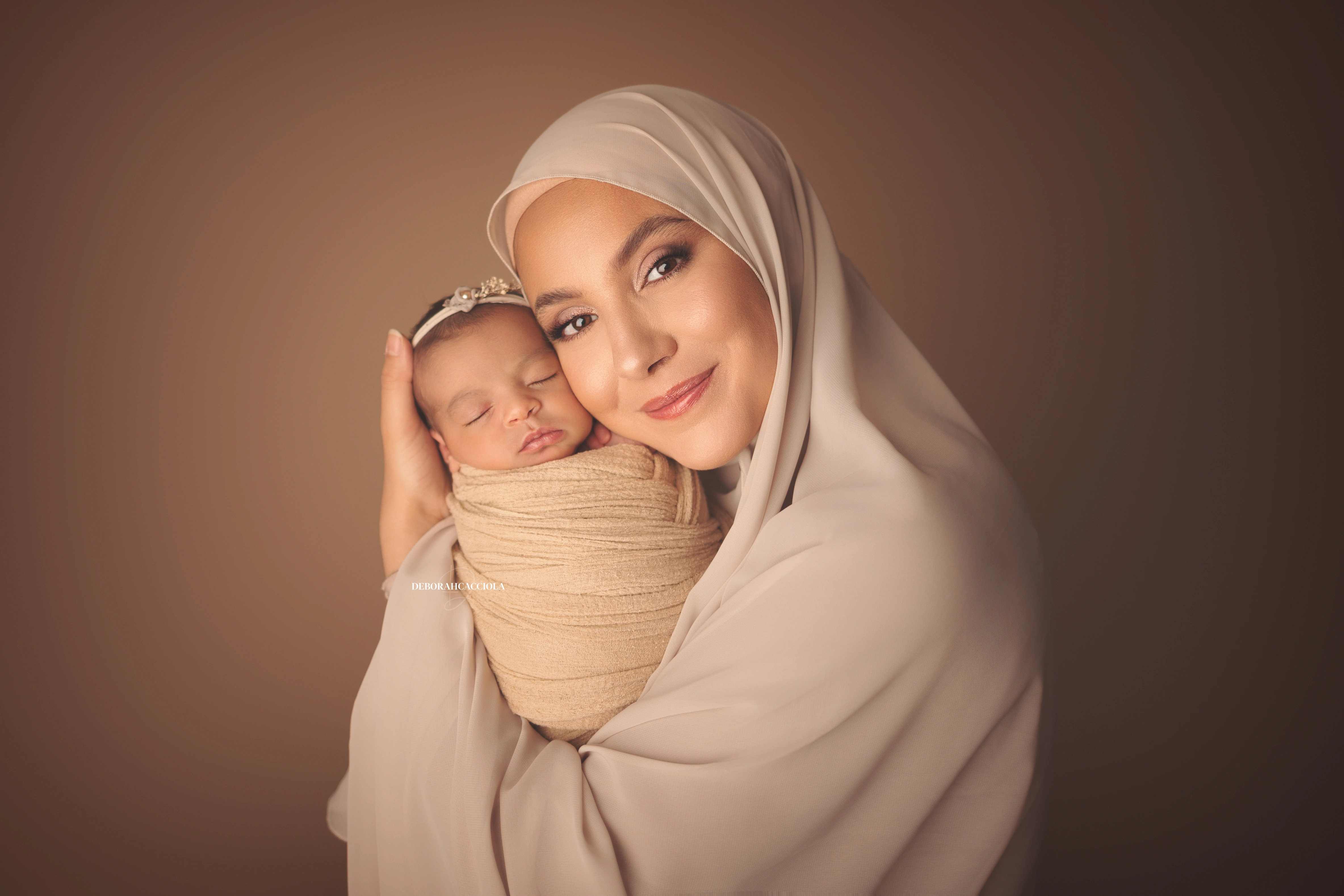 newborn portrait in Orléans, France: baby in the first days, wide natural composition, soft colors
