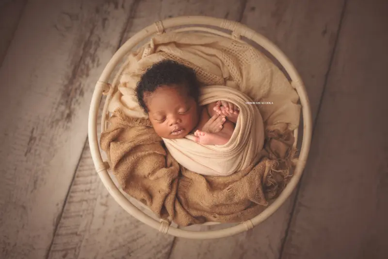 baby session in Orléans, France - tender moment with baby, harmonious wide shot, soft colors