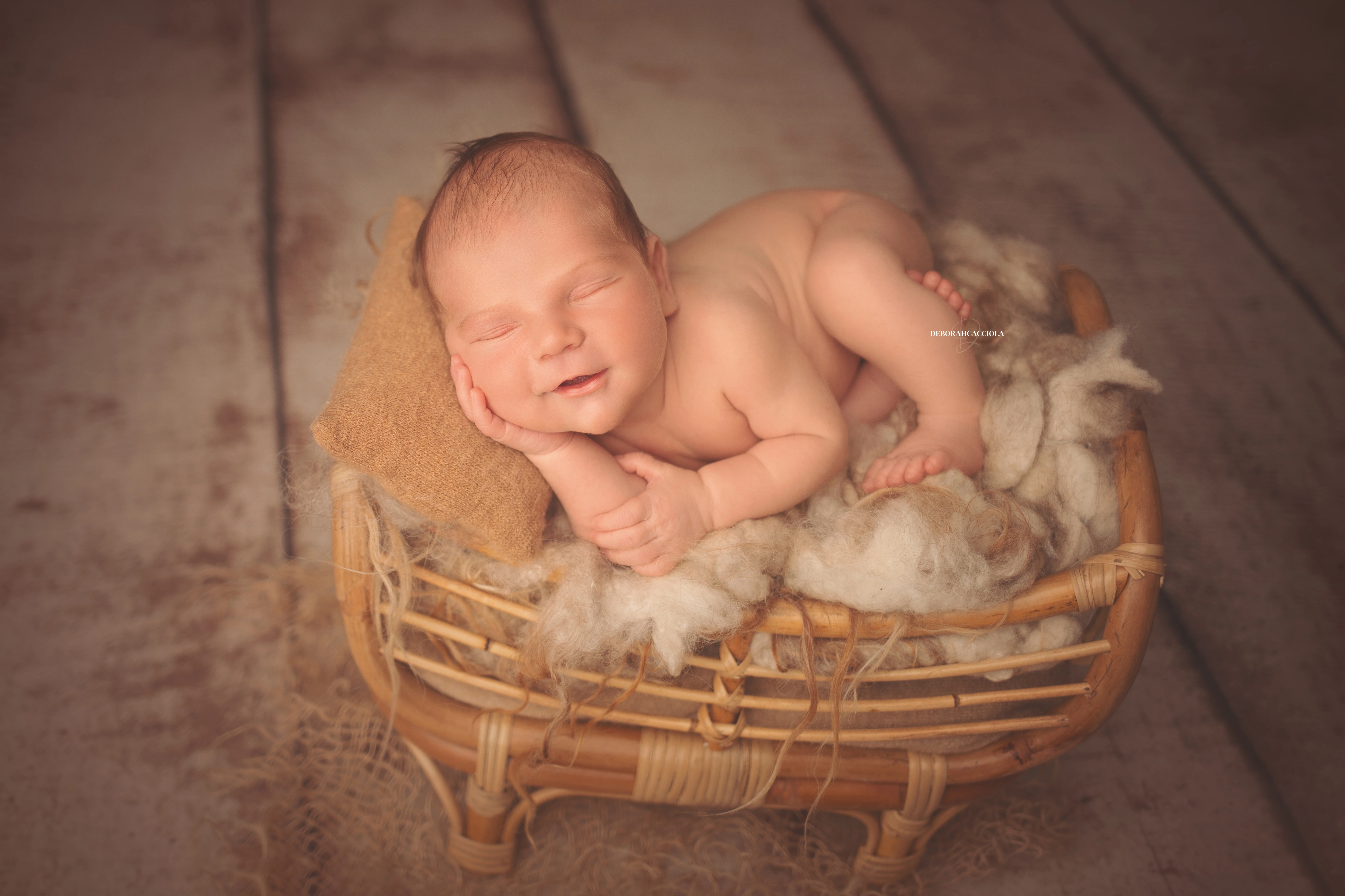 newborn portrait in Orléans, France: tender moment with baby, harmonious wide shot, balanced colors
