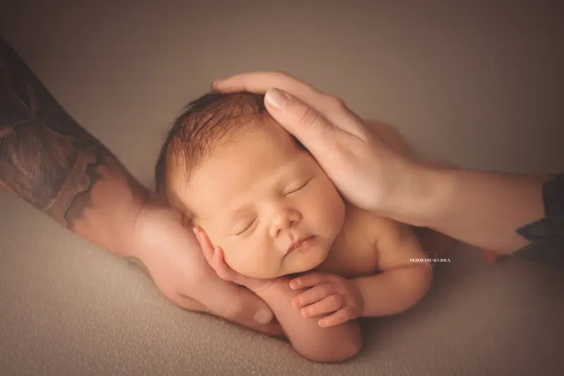 baby session in Orléans, France - tender moment with baby, harmonious wide shot, soft colors
