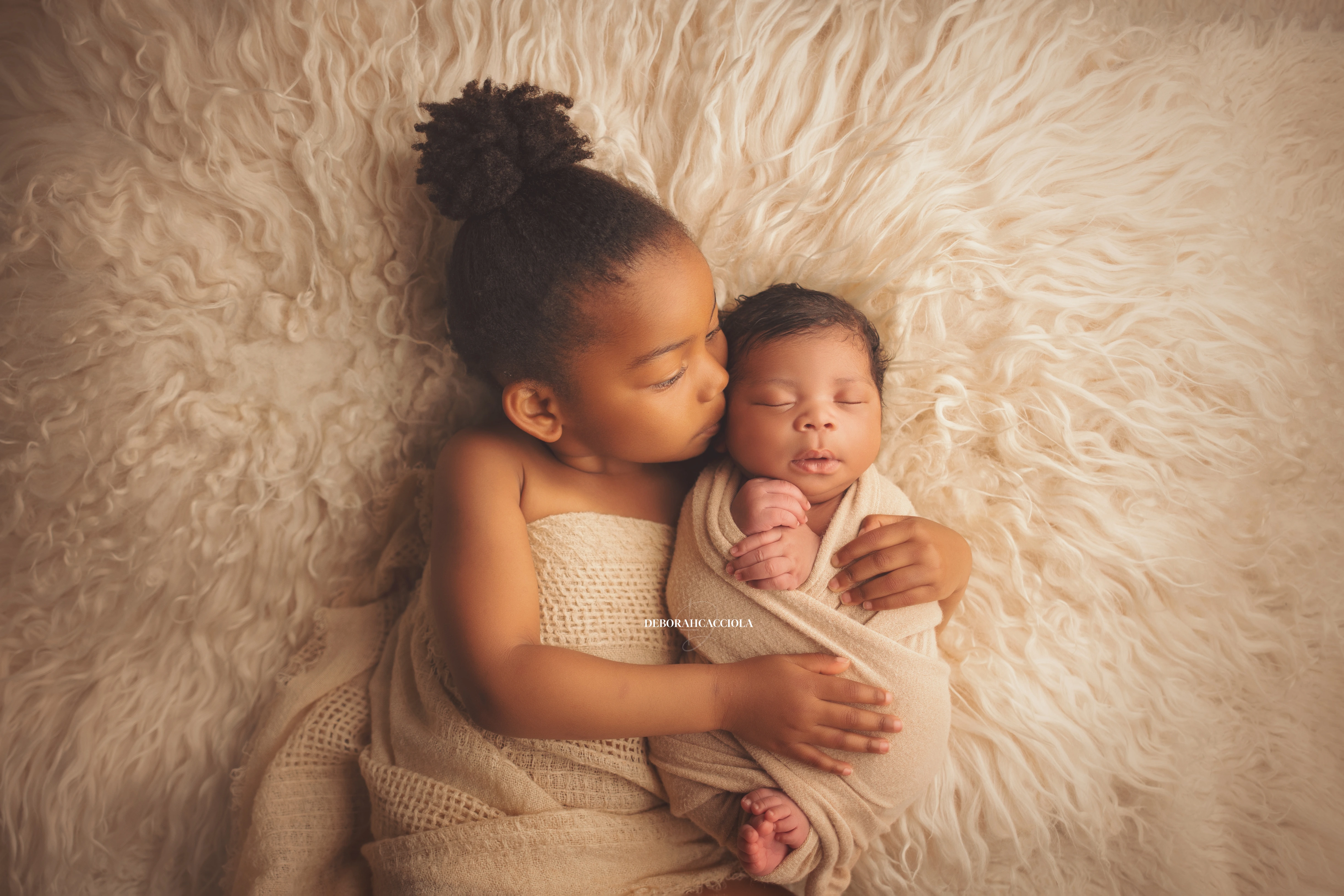 newborn portrait Orléans, France: newborn in studio, soft panoramic scene, natural tones