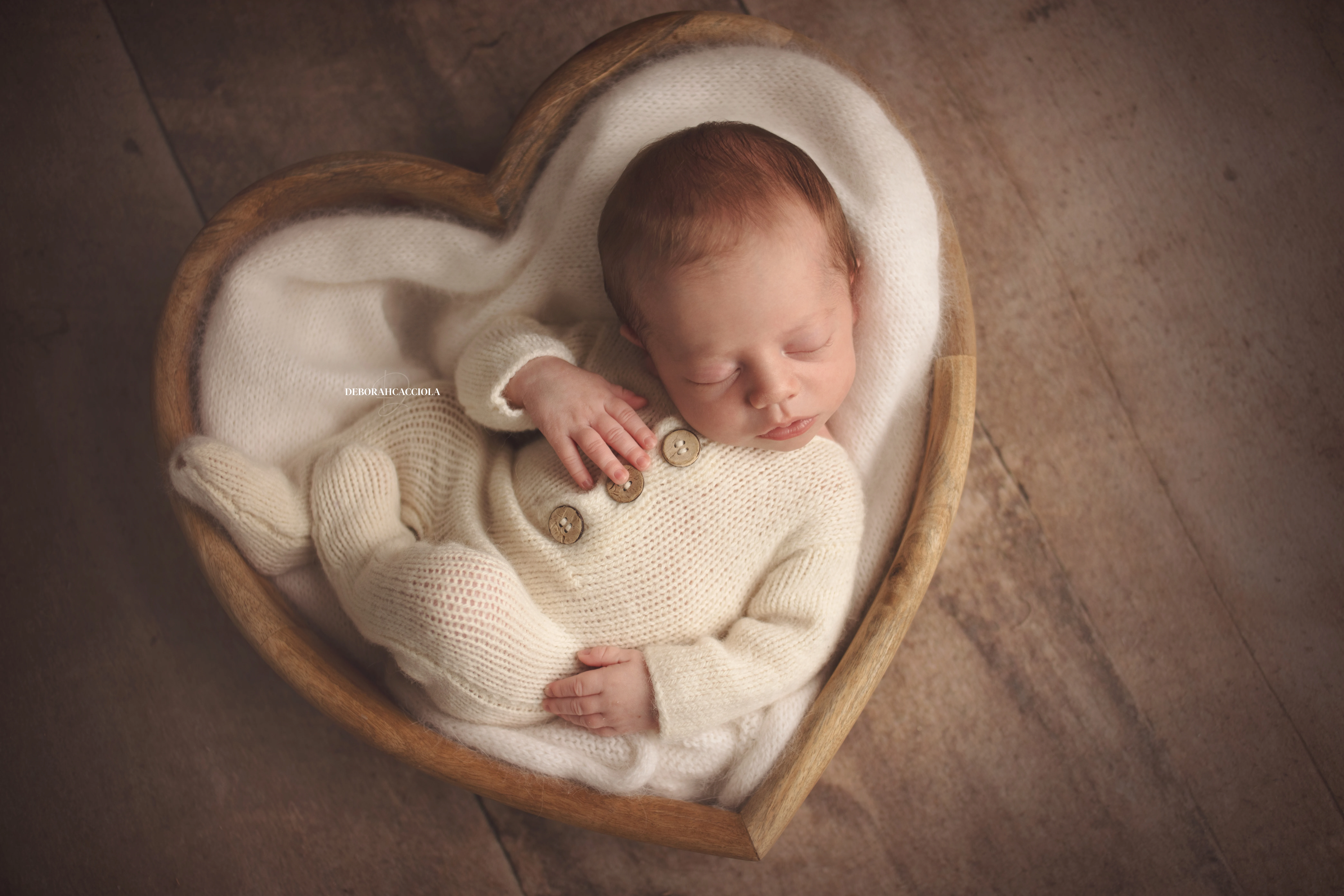 baby session in Orléans, France - tender moment with baby, harmonious wide shot, natural tones