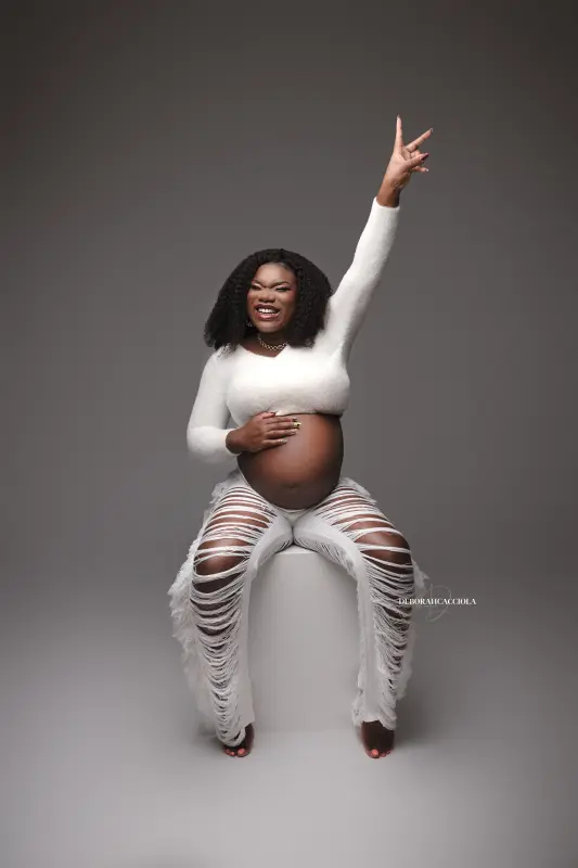 maternity portrait in Orléans, France, pregnancy moment, elegant vertical shot, bright style