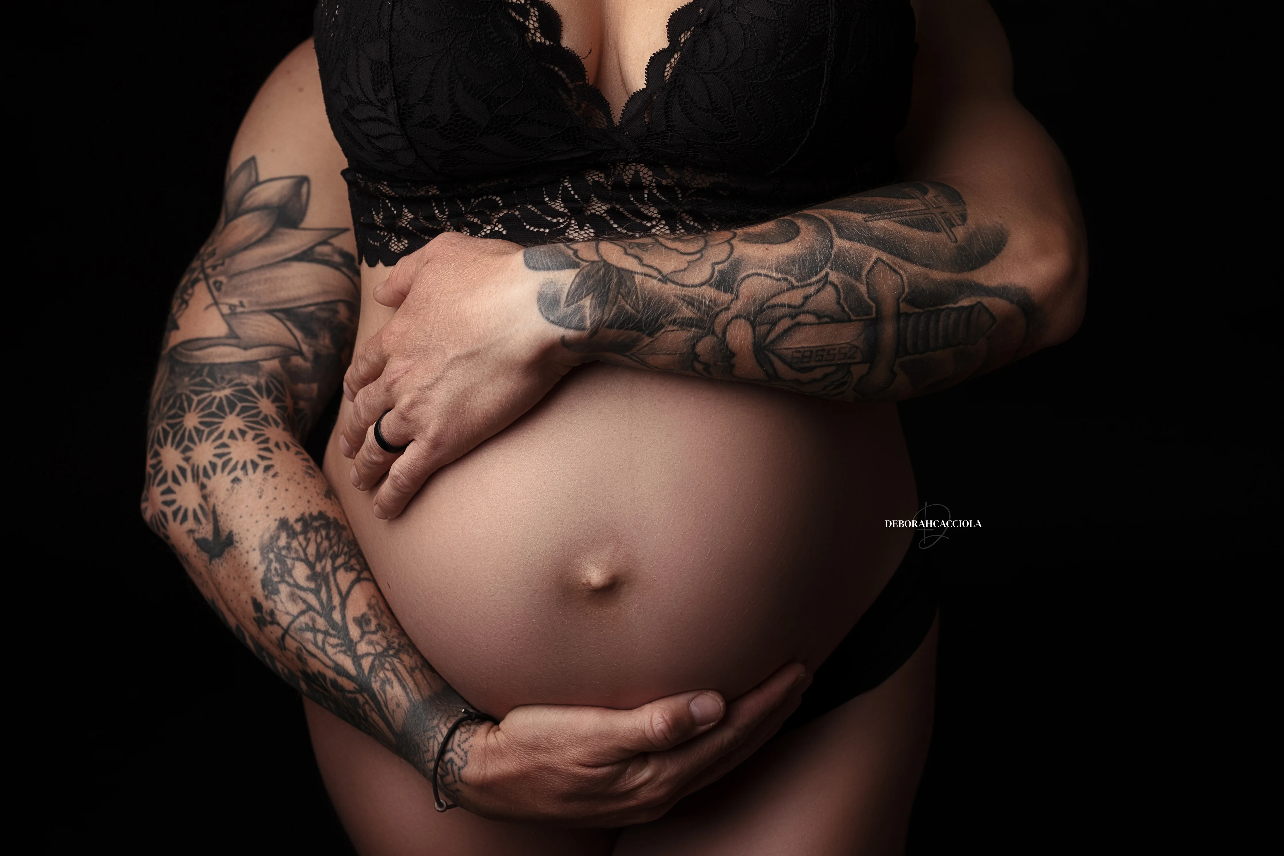 pregnancy scene in Orléans, France: maternity silhouette, soft horizontal setup, natural tones
