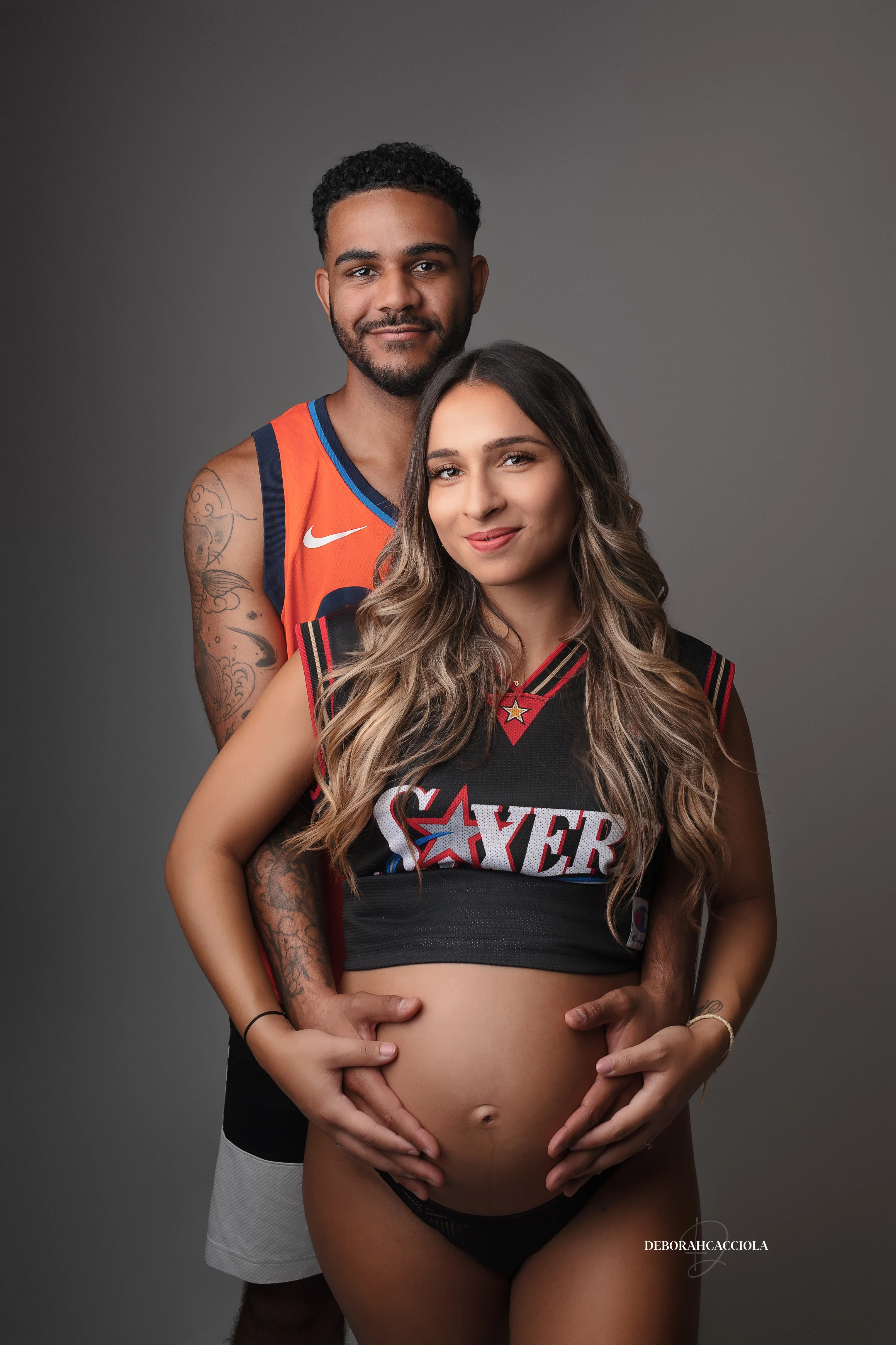 maternity portrait in Orléans, France, pregnant woman, elegant vertical shot, bright style
