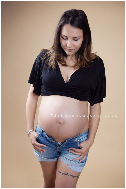 pregnancy portrait Orléans, France, mother-to-be during a studio session, soft vertical framing, in color