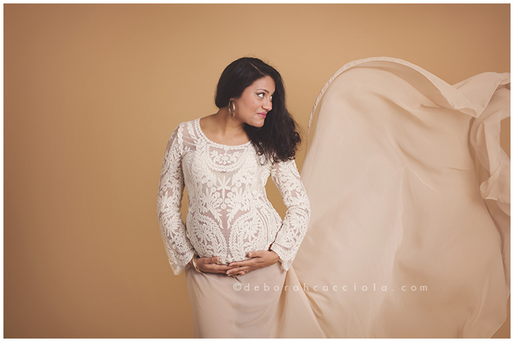 pregnancy scene in Orléans, France: mother-to-be, balanced horizontal framing, natural tones