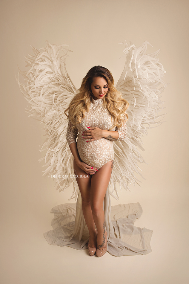 maternity portrait in Orléans, France: pregnant woman, elegant vertical shot, bright style