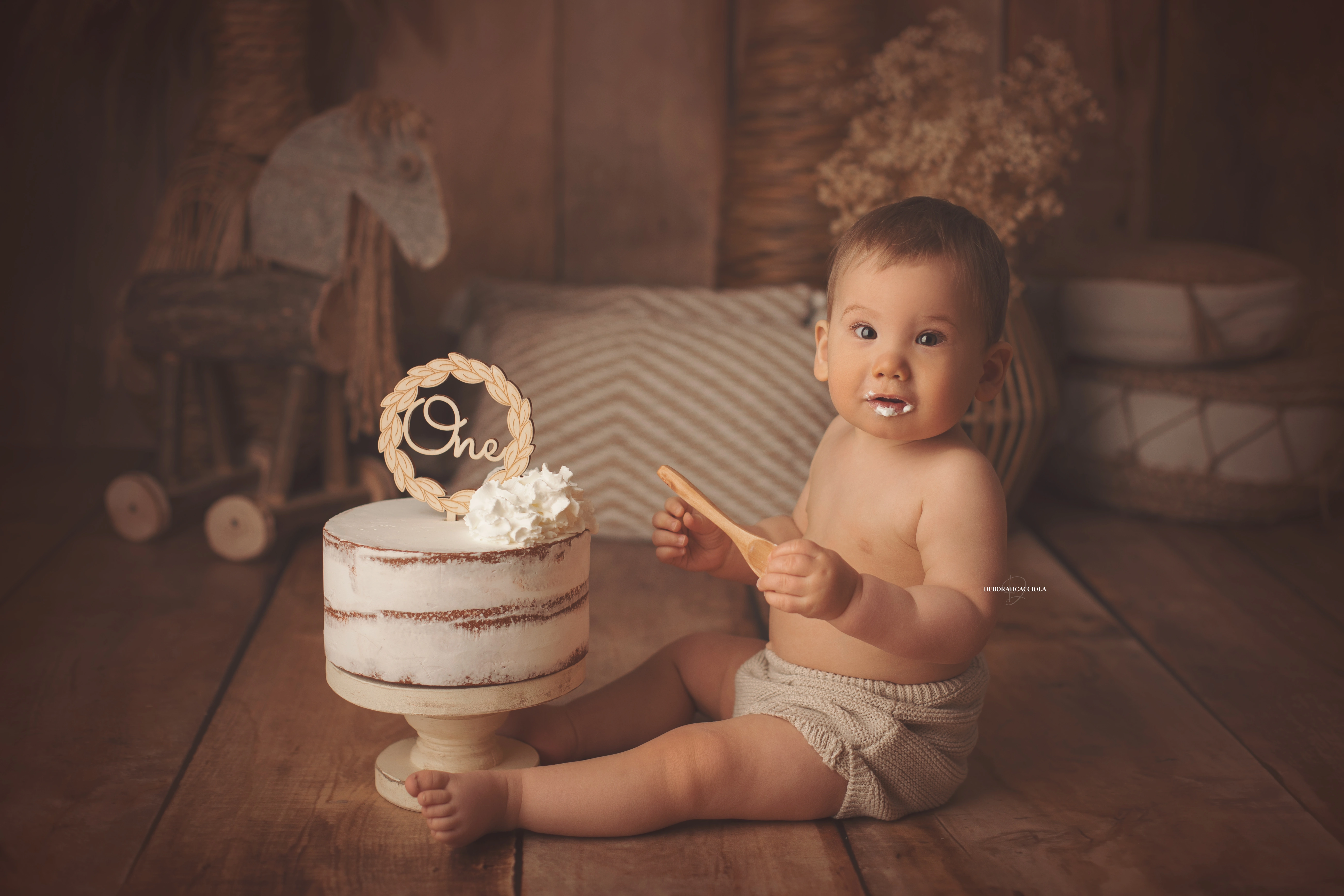 Photo anniversaire à Orléans, moment festif en studio, composition large et naturelle, couleurs douces