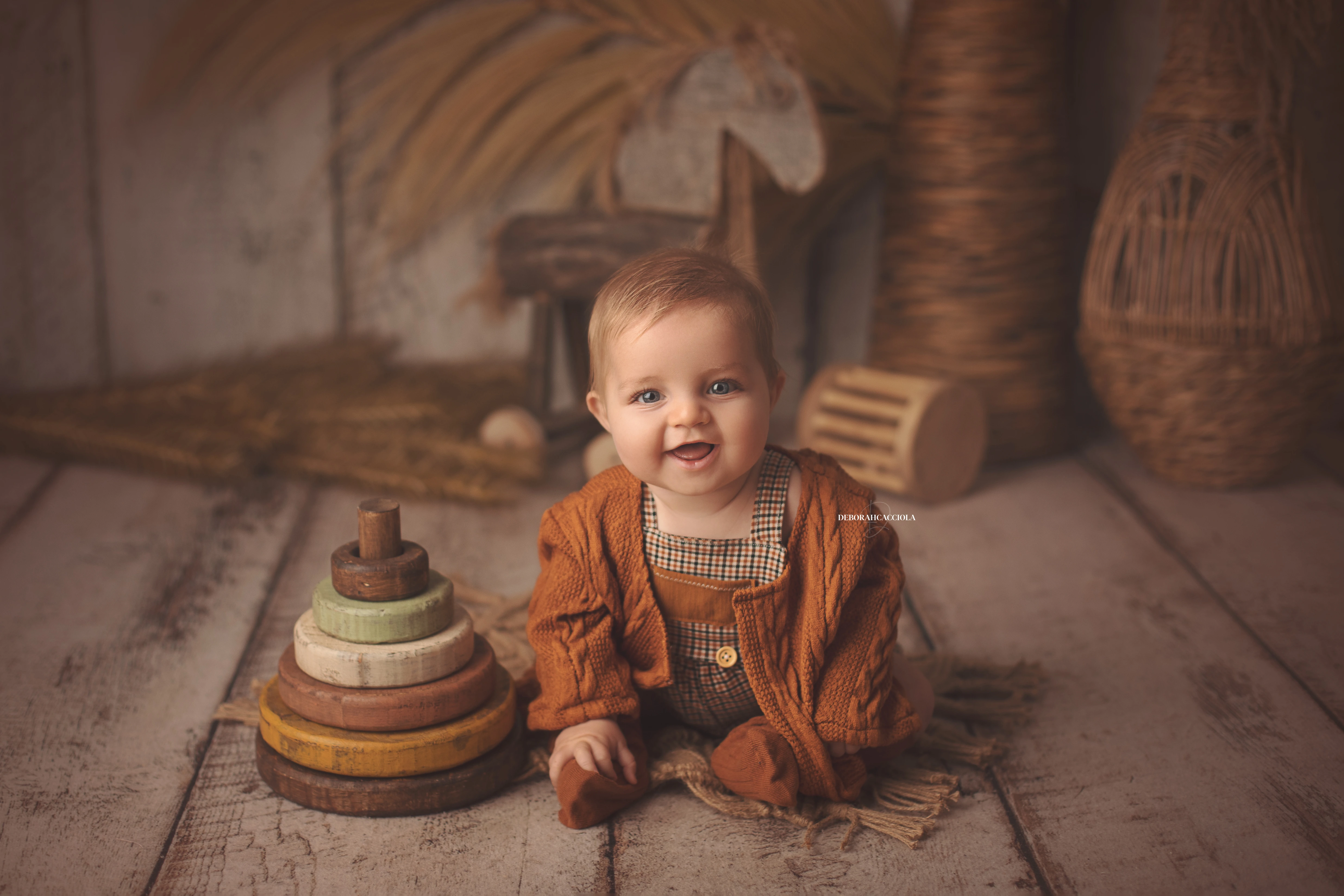 Portrait bébé à Orléans : portrait tendre de bébé, composition large et naturelle, couleurs douces