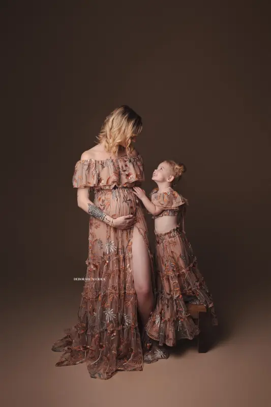 Photo grossesse à Orléans, instant de grossesse, plan vertical élégant, couleurs naturelles