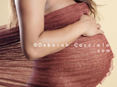 Photo grossesse Photo de femme enceinte dans un voile chocolat