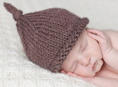 Photo nouveau-ne Photo de bébé vêtu de tricots de laine