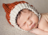 Photo nouveau-ne Photo de bébé dormant avec son bonnet